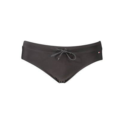 Swim Briefs by Tommy Hilfiger for men in stretch polyester black features a refined silhouette, showcasing the refined design of this Men's Stretch Polyester Swim Briefs with a refined fit.