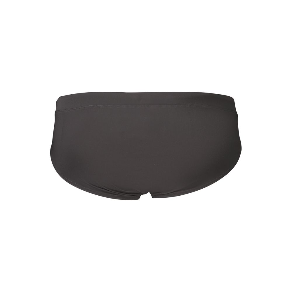 Swim Briefs by Tommy Hilfiger for men in stretch polyester black features a riviera ready silhouette from the Men's Stretch Polyester Swim Briefs collection, showcasing a riviera ready finish with a streamlined riviera ready fit.