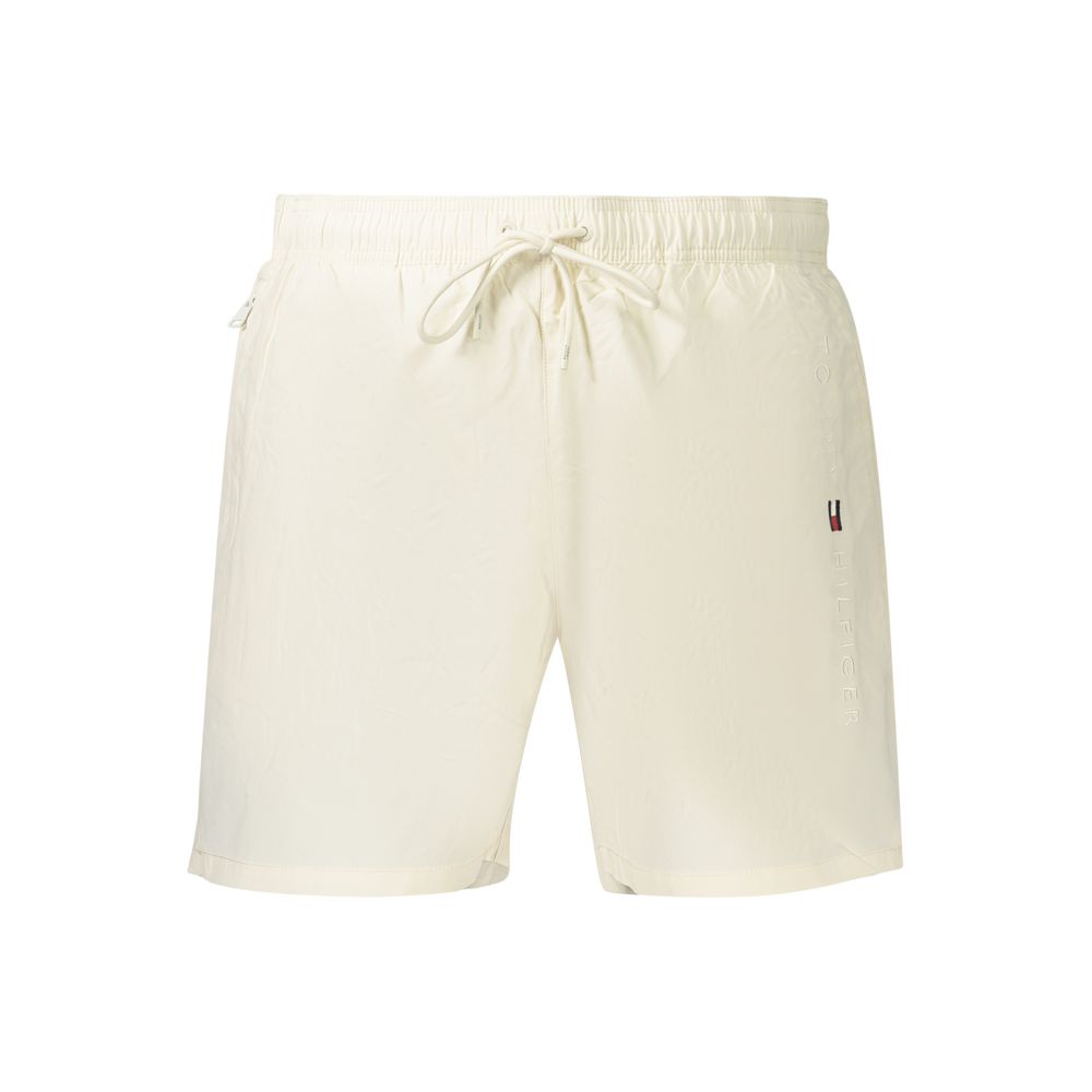 Swim Shorts by Tommy Hilfiger for men in polyester beige features a resort ready silhouette, perfectly capturing the resort ready aesthetic of Men's Polyester Swim Shorts with a resort ready finish.