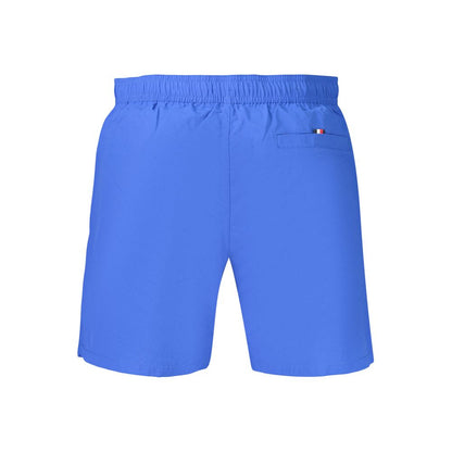 Swim Shorts by Tommy Hilfiger for men in polyester blue & signature features an dramatic silhouette that defines the luxurious aesthetic and refined cut of the Men's Polyester Swim Shorts.