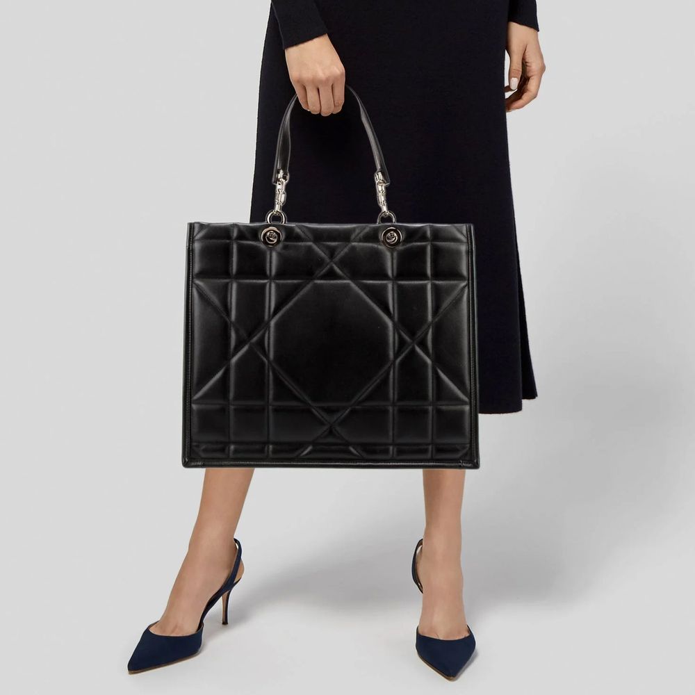 Tote Bag by Dior for women in suede leather black features an jet-setting Suede Leather Tote Bag design with a secure , jet-setting , and versatile shoulder-strap for a jet-setting look.