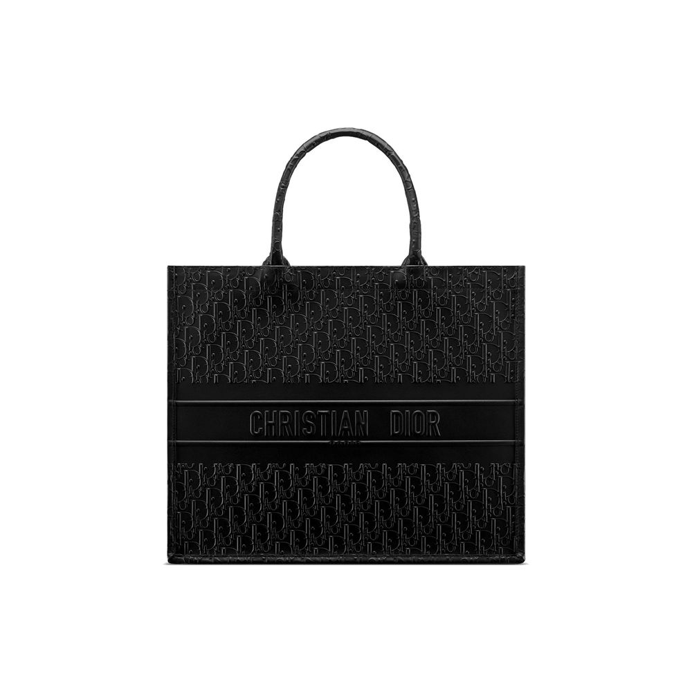 This Tote Bag by Dior for women in calfskin leather black features an jet-set Calfskin Leather Tote Bag design with a secure , ample , and jet-set handle.