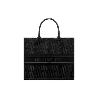 This Tote Bag by Dior for women in calfskin leather black features an jet-set Calfskin Leather Tote Bag design with a secure , ample , and jet-set handle.