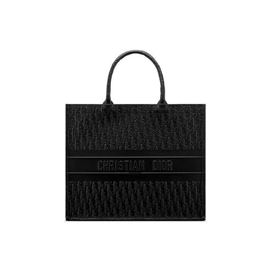 This Tote Bag by Dior for women in calfskin leather black features an jet-set Calfskin Leather Tote Bag design with a secure , ample , and jet-set handle.