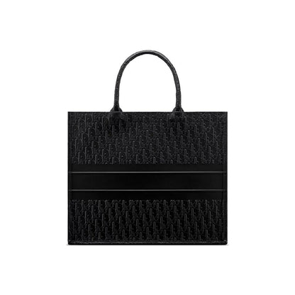 Tote Bag by Dior for women in calfskin leather black showcases a statuesque Calfskin Leather Tote Bag design, featuring a secure , ample , and versatile handle for a statuesque finish.