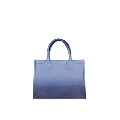 Tote Bag by Dior for women in calfskin leather blue features an jet-set-ready silhouette, showcasing the Calfskin Leather Tote Bag design with a secure , ample , and versatile handle.