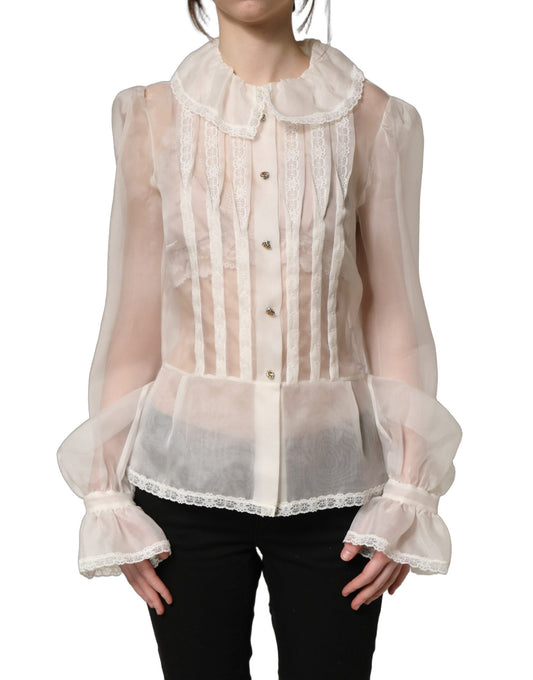 Blouse by Dolce & Gabbana for women in silk & nylon white showcases a sublime silhouette, artfully detailed with a sublime wrap neckline and long-sleeve for a sophisticated, sublime finish.