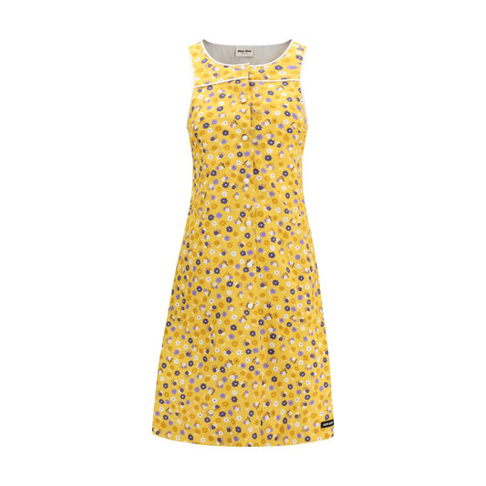 Dress by Miu Miu for women in cotton bicolour, patterned, floral & print features an eye catching silhouette with a sophisticated round neckline, elegant sleeveless, and a refined midi for a eye catching aesthetic.