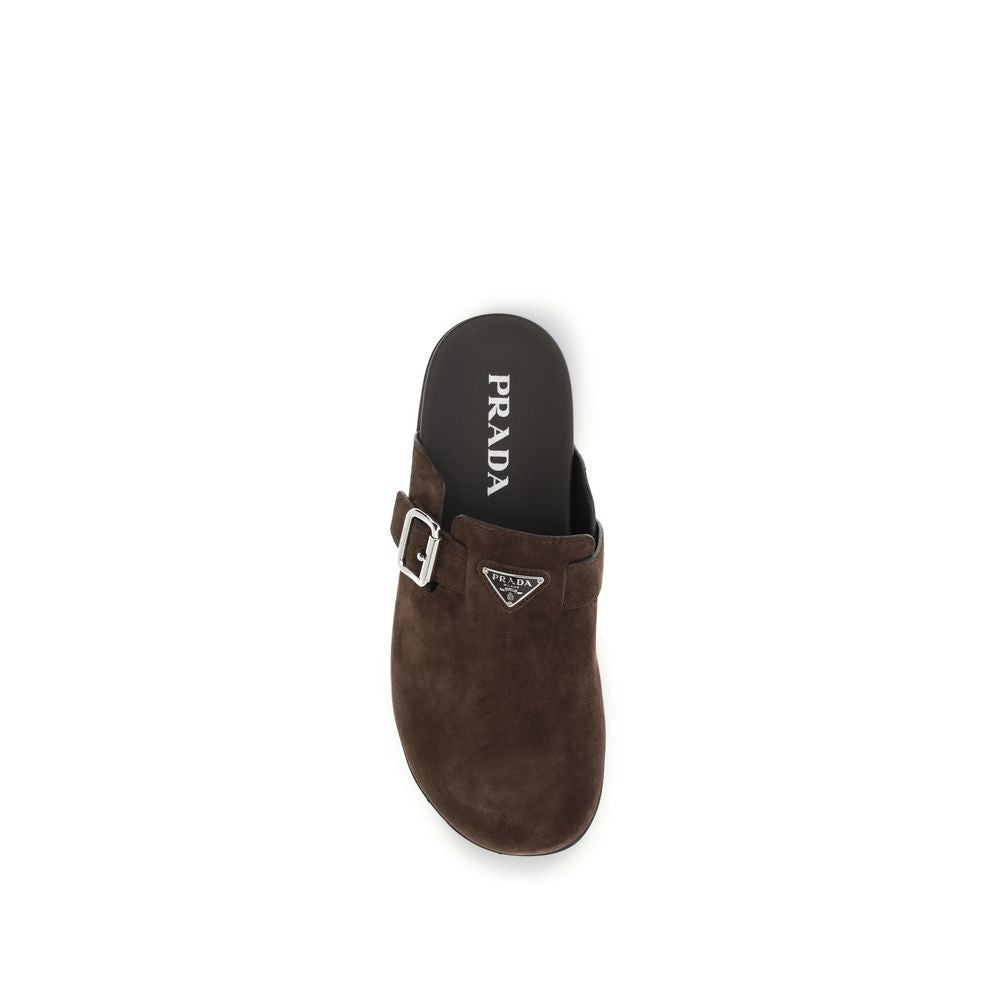 Flat Mule Mules Strap Shoes by Prada for men in bos taurus suede calf leather brown features an ergonomic silhouette, perfectly showcasing Men's Bos Taurus Suede Calf Leather Flat Mule Mules Strap Shoes with its distinct flat and elegant round toe style.