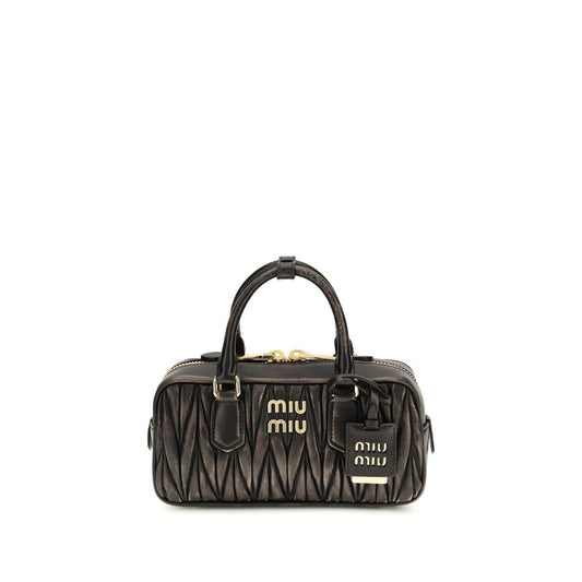 Quilted Satchel Pouch Handbag by Miu Miu for women in nappa lambskin leather & cotton brown, gold & patterned features a contemporary silhouette, showcasing a secure zipper, ample , and contemporary shoulder-strap, adjustable-strap & handle for a sophisticated look.
