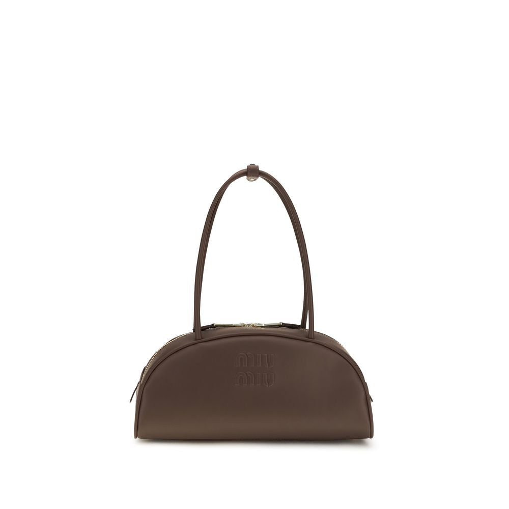 Shoulder Bowling Handbag by Miu Miu for women in polyurethane & bos taurus calf leather brown & gold presents a ornamental silhouette, showcasing a secure zipper, ample cardholder, and versatile shoulder-strap for a ornamental finish.