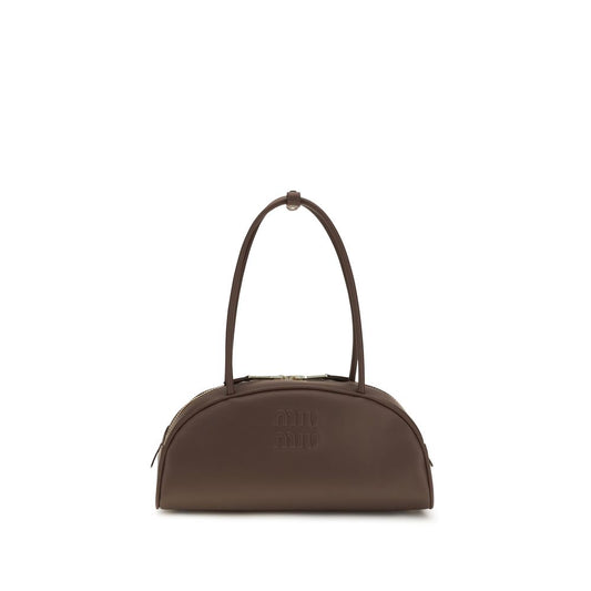 Shoulder Bowling Handbag by Miu Miu for women in polyurethane & bos taurus calf leather brown & gold presents a ornamental silhouette, showcasing a secure zipper, ample cardholder, and versatile shoulder-strap for a ornamental finish.