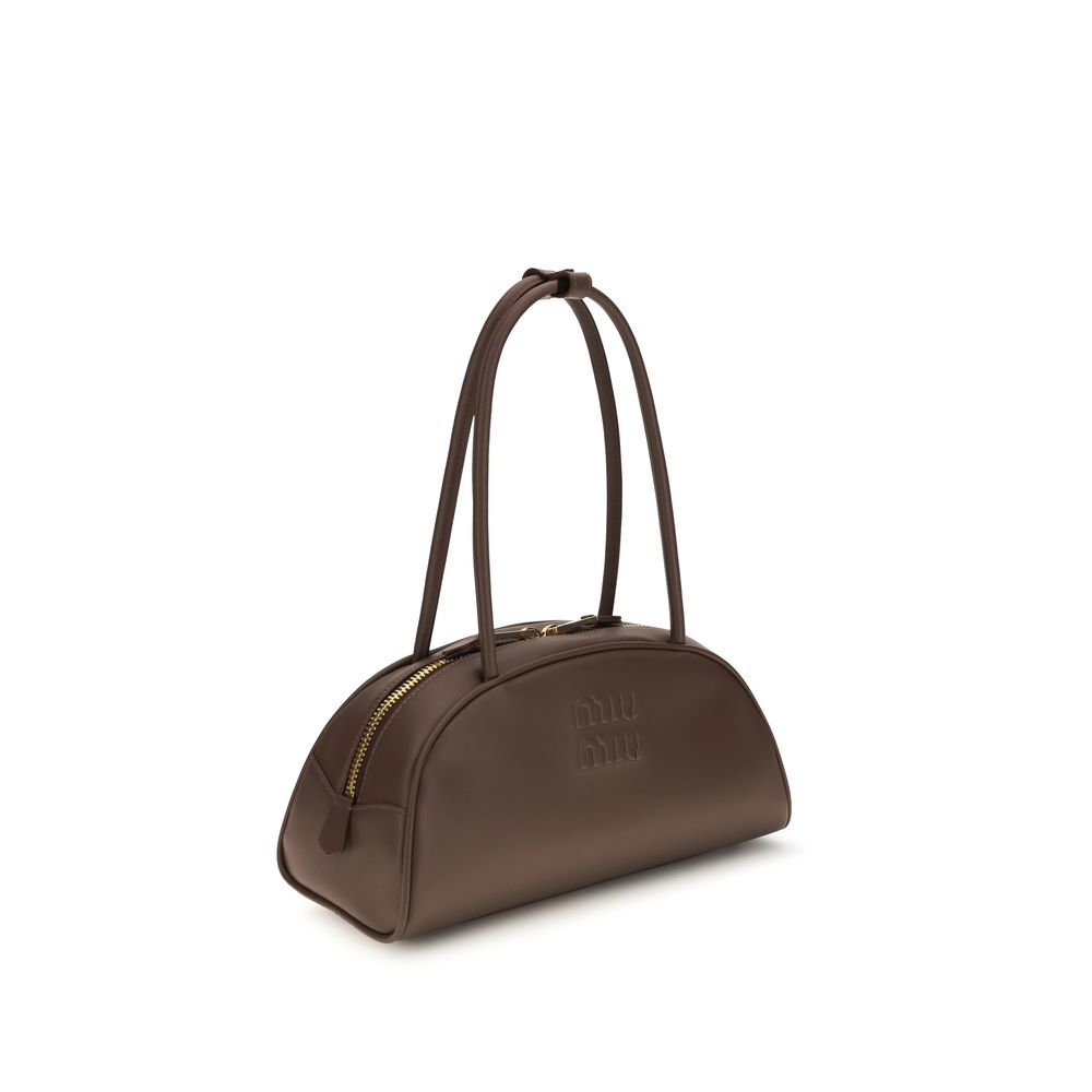 Shoulder Bowling Handbag by Miu Miu for women in polyurethane & bos taurus calf leather brown & gold features a contemporary silhouette, showcasing a secure zipper, ample cardholder, and contemporary shoulder-strap for a sophisticated look.