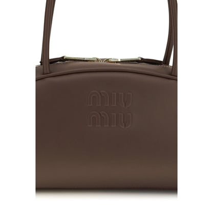 Shoulder Bowling Handbag by Miu Miu for women in polyurethane & bos taurus calf leather brown & gold features a signature silhouette, showcasing a secure zipper and signature cardholder with versatile shoulder-strap for a sophisticated look.