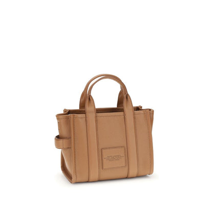 Small Crossbody Tote Handbag by Marc Jacobs for women in bos taurus calf grained leather brown, monogram & print features a signature silhouette, showcasing a secure and signature with versatile crossbody-strap, shoulder-strap, handle & adjustable-strap for a sophisticated look.