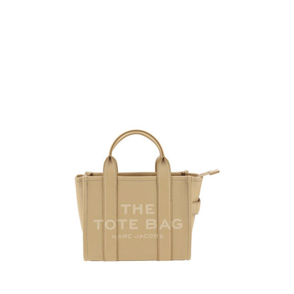 Small Crossbody Tote Handbag by Marc Jacobs for women in bos taurus calf grained leather beige & monogram features a refined silhouette, showcasing a secure , organized , and versatile crossbody-strap, shoulder-strap, handle & adjustable-strap for a refined finish.