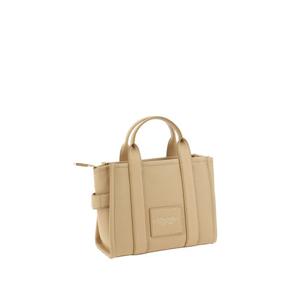 Small Crossbody Tote Handbag by Marc Jacobs for women in bos taurus calf grained leather beige & monogram features a exquisite silhouette, showcasing a secure and exquisite with versatile crossbody-strap, shoulder-strap, handle & adjustable-strap for a exquisite finish.