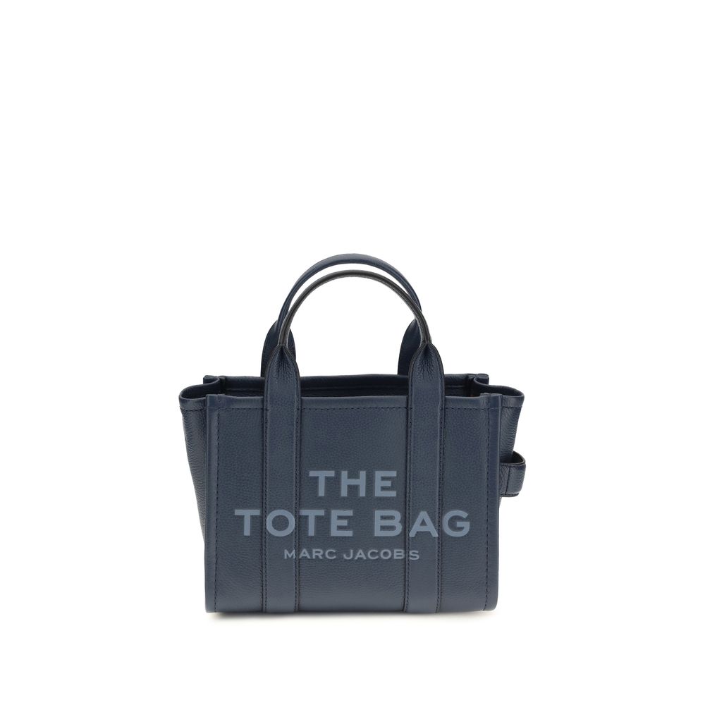 Small Crossbody Tote Handbag by Marc Jacobs for women in bos taurus calf grained leather blue & monogram features an refined silhouette, showcasing a secure , ample , and versatile crossbody-strap, shoulder-strap, handle & adjustable-strap for a sophisticated refined aesthetic.