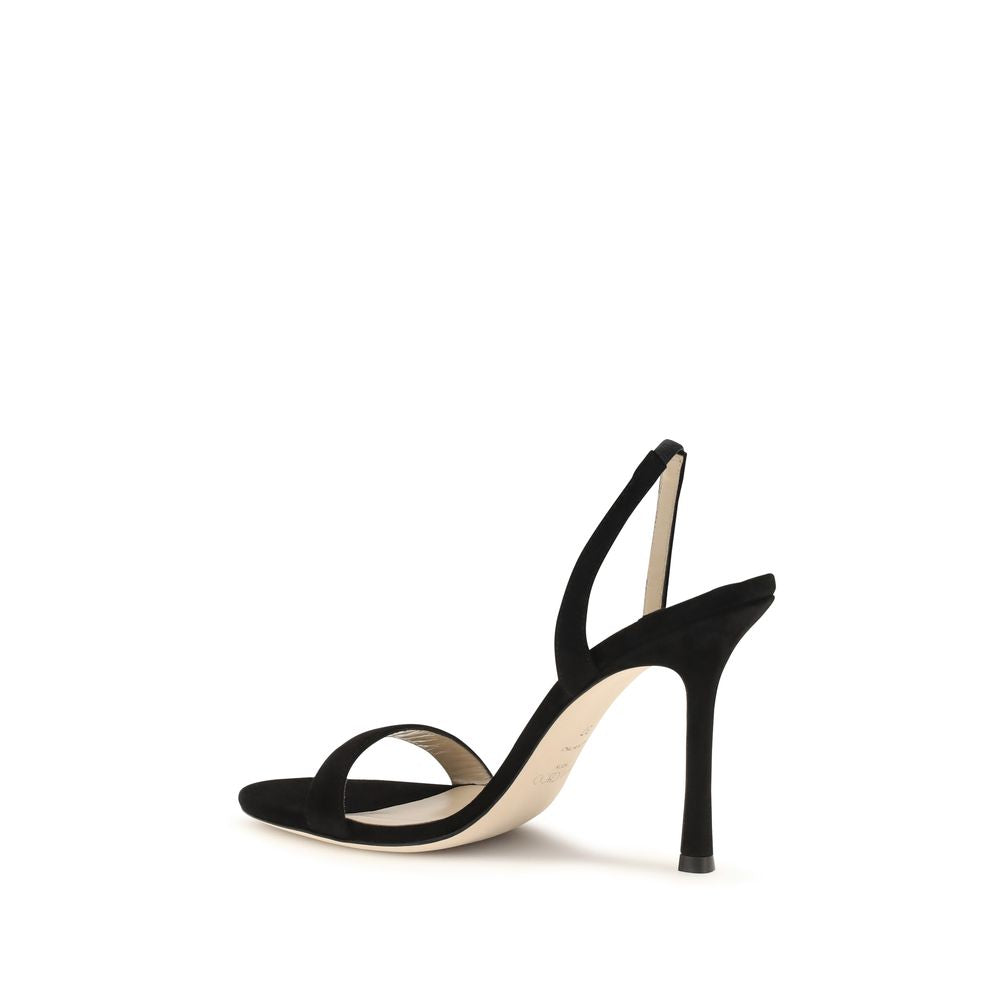 Stiletto Sandals by Jimmy Choo for women in bos taurus calf suede leather black showcases a sculptural silhouette as Women's Bos Taurus Calf Suede Leather Stiletto Sandals, defined by a sculptural stiletto and sculptural for a sculptural look.