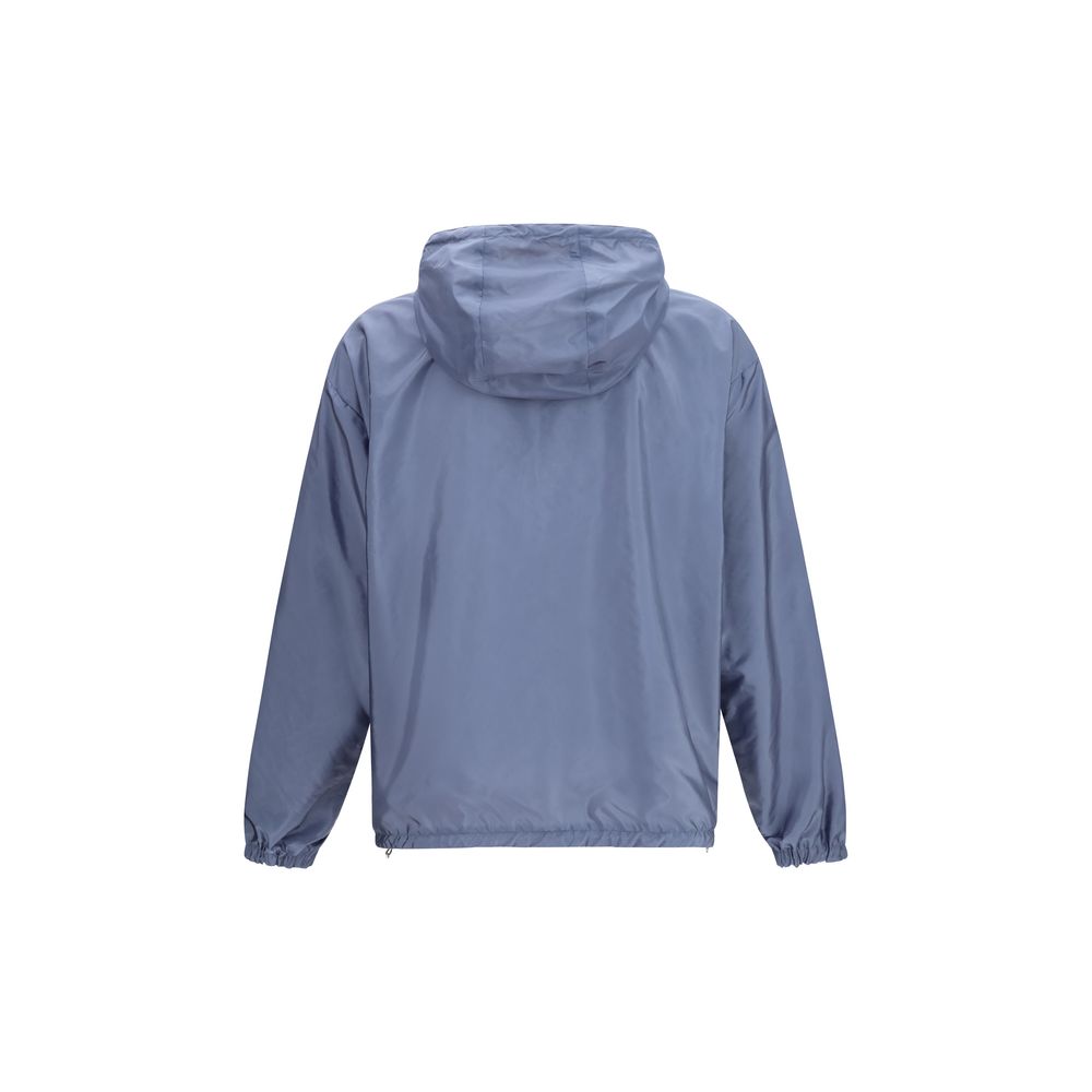 Hooded Puffer Jacket by Prada for men in nylon beige & signature features a city-ready silhouette, detailed with pockets, hooded, insulated & windproof and a city-ready hooded neckline.