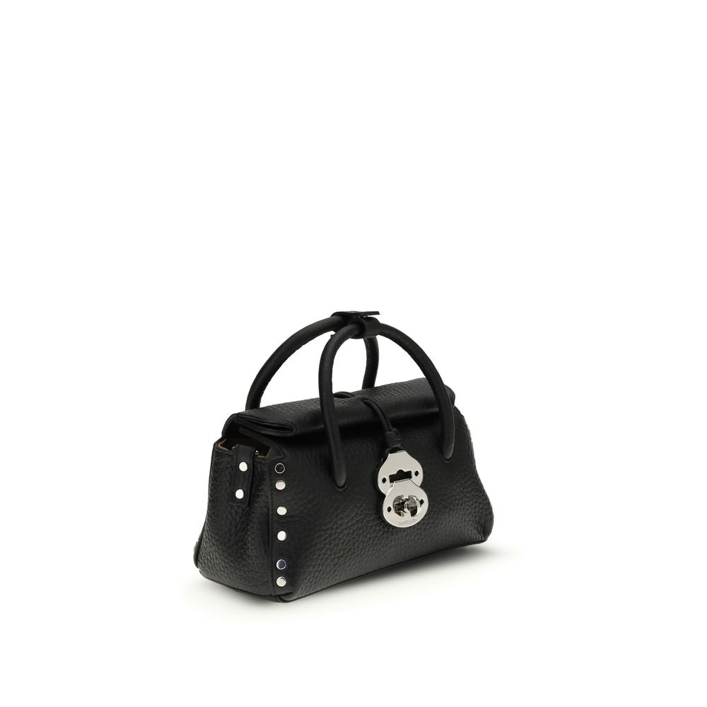 Handbag by Zanellato for women in bos taurus calf leather black features a signature silhouette, showcasing a secure magnetic, buckle & roll-top and signature with versatile shoulder-strap & adjustable-strap for a sophisticated look.