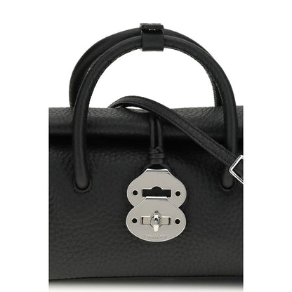 Handbag by Zanellato for women in bos taurus calf leather black features a contemporary silhouette, showcasing a secure magnetic, buckle & roll-top, ample , and contemporary shoulder-strap & adjustable-strap for a sophisticated look.