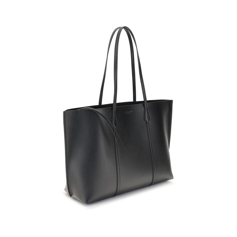 Small Tote Handbag by Tory Burch for women in grained bos taurus calf leather black & monogram features a refined silhouette, showcasing a secure snap & button, organized laptop-compartment, and versatile handle for a refined finish.