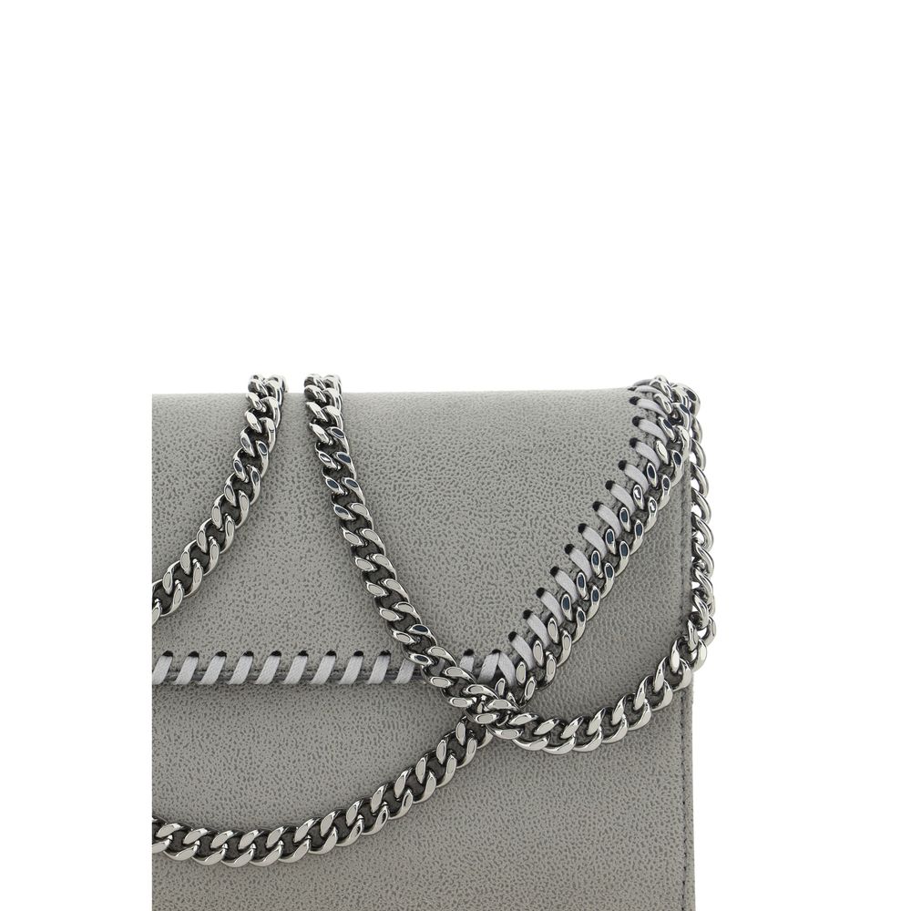 Compact Flap Shoulder Bag by Stella McCartney for women in polyester faux leather gray, silver & signature features an effortlessly chic silhouette with a secure flap & magnetic, ample , and versatile shoulder-strap for effortlessly chic everyday luxury.