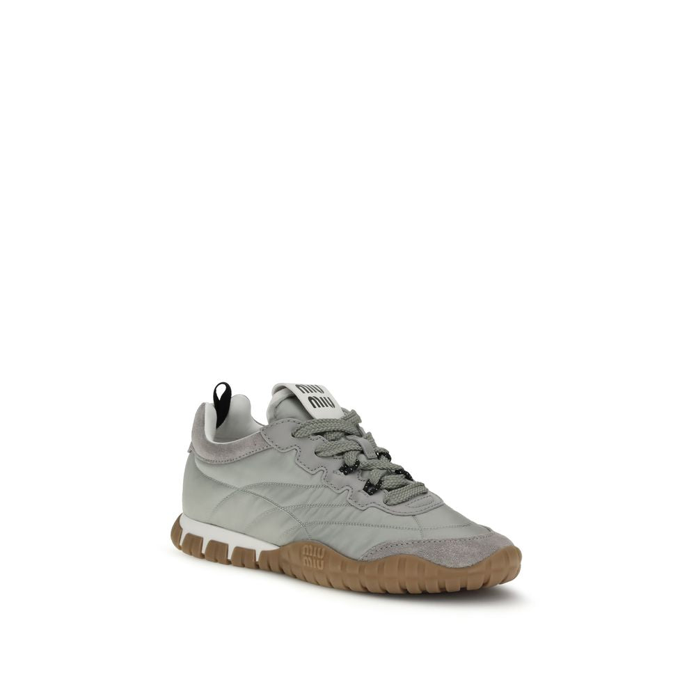Athletic Sneakers by Miu Miu for women in eva polyamide & bos taurus suede calf leather gray showcases an impeccable silhouette, defined by an impeccable athletic style design that perfectly captures the essence of the Star Women's Athletic EVA Polyamide & Bos Taurus Suede Calf Leather Sneakers.