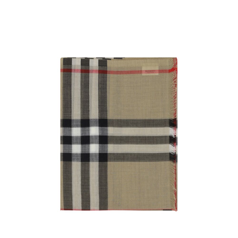Scarf by Burberry for women in wool & silk brown & patterned features a timeless silhouette, artfully capturing the essence of the timeless Wool & Silk Frayed-Edge Scarf design for a sophisticated look.