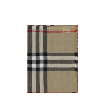 Scarf by Burberry for women in wool & silk brown & patterned features a timeless silhouette, artfully capturing the essence of the timeless Wool & Silk Frayed-Edge Scarf design for a sophisticated look.