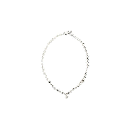 Necklace by Alexander McQueen for men in silk and pearl, silver, white & signature showcases a radiant silhouette, artfully capturing the elegance of Skull Men's Silver Brass & Pearls Necklace through its intricate pendant necklace design.