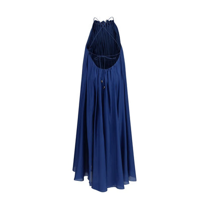 Dress by Zimmermann for women in silk blue & pearl features a dramatic silhouette, showcasing an elegant and that flows into a dramatic long.