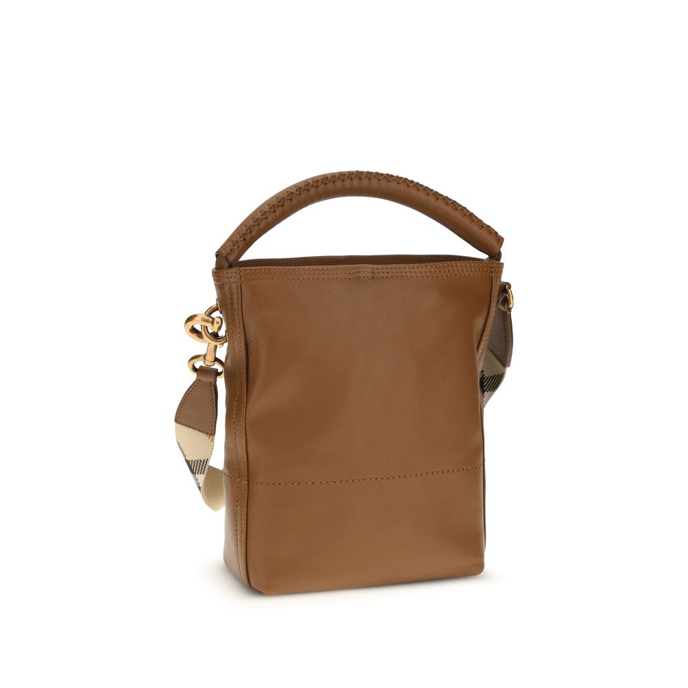 Bucket Handbag by Burberry for women in bos taurus calf leather brown & patterned features a effortlessly chic silhouette, showcasing a secure clip and ample with versatile adjustable-strap & detachable-strap for a effortlessly chic finish.