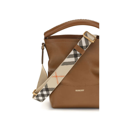 Bucket Handbag by Burberry for women in bos taurus calf leather brown & patterned features a effortlessly chic silhouette, showcasing a secure clip, ample , and versatile adjustable-strap & detachable-strap for a effortlessly chic look.