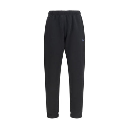 Jogger Sweatpants by Kenzo for men in cotton black & signature features a contemporary silhouette with , a contemporary regular-fit, long hem, and for a premium, high-performance aesthetic.