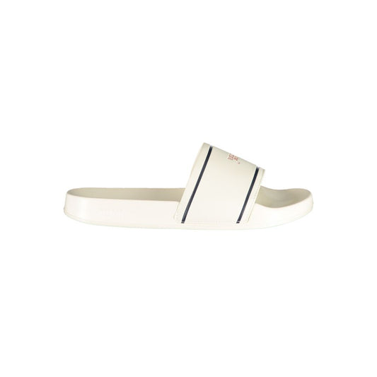 Sandals by Tommy Hilfiger for women in polyester & polyurethane white & print features an statuesque silhouette from the The Blend Women's Polyester & Polyurethane Sandals collection, showcasing a statuesque and elegant .