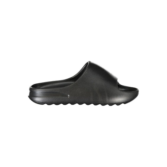 Slider Sandals by Norway 1963 for women in polyurethane black features an architectural design from the Women's Polyurethane Slider Sandals collection, defined by a architectural and for a architectural finish.