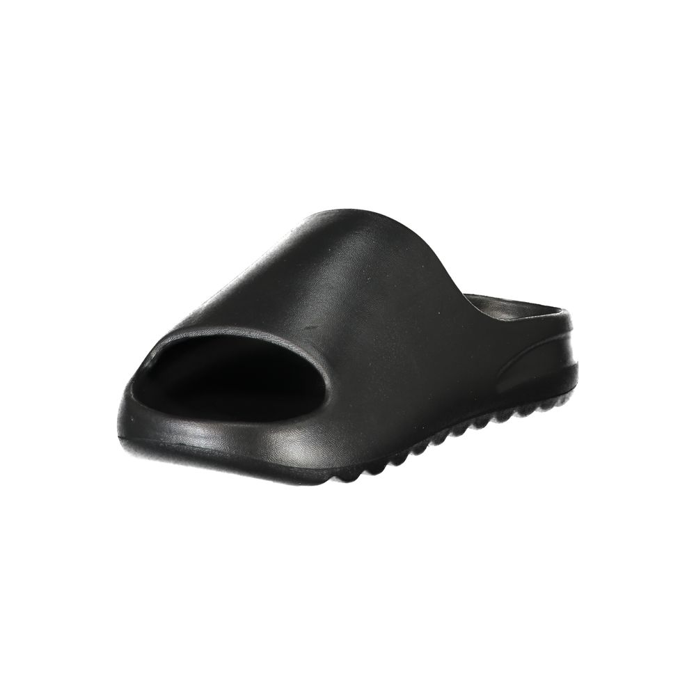 Slider Sandals by Norway 1963 for women in polyurethane black features an statuesque Women's Polyurethane Slider Sandals silhouette with a refined and elegant .