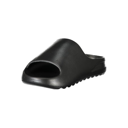 Slider Sandals by Norway 1963 for women in polyurethane black features an statuesque Women's Polyurethane Slider Sandals silhouette with a refined and elegant .