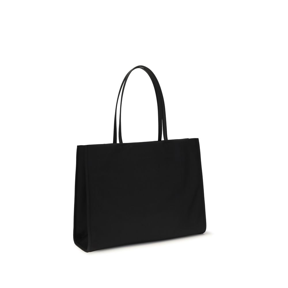 Tote Handbag by Tory Burch for women in nylon fabric black & signature features a exquisite silhouette, showcasing a secure zipper & magnetic and exquisite laptop-compartment with versatile handle for a exquisite finish.