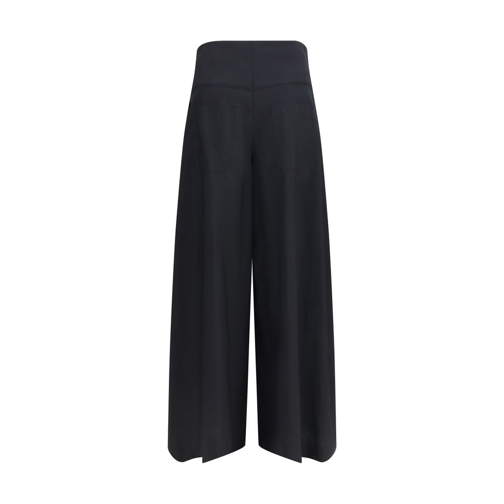 Casual Pants by Brunello Cucinelli for women in polyamide cotton black features an sophisticated and wide & oversized with a precise long, creating a sophisticated and sophisticated silhouette.