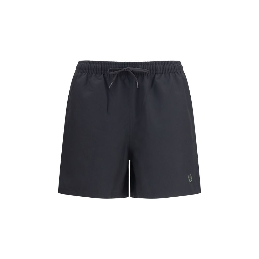 Swim Shorts by Fred Perry for men in polyester black & signature features a beach chic silhouette, showcasing the signature style of the Laurel Perry Men's Polyester Swim Shorts.