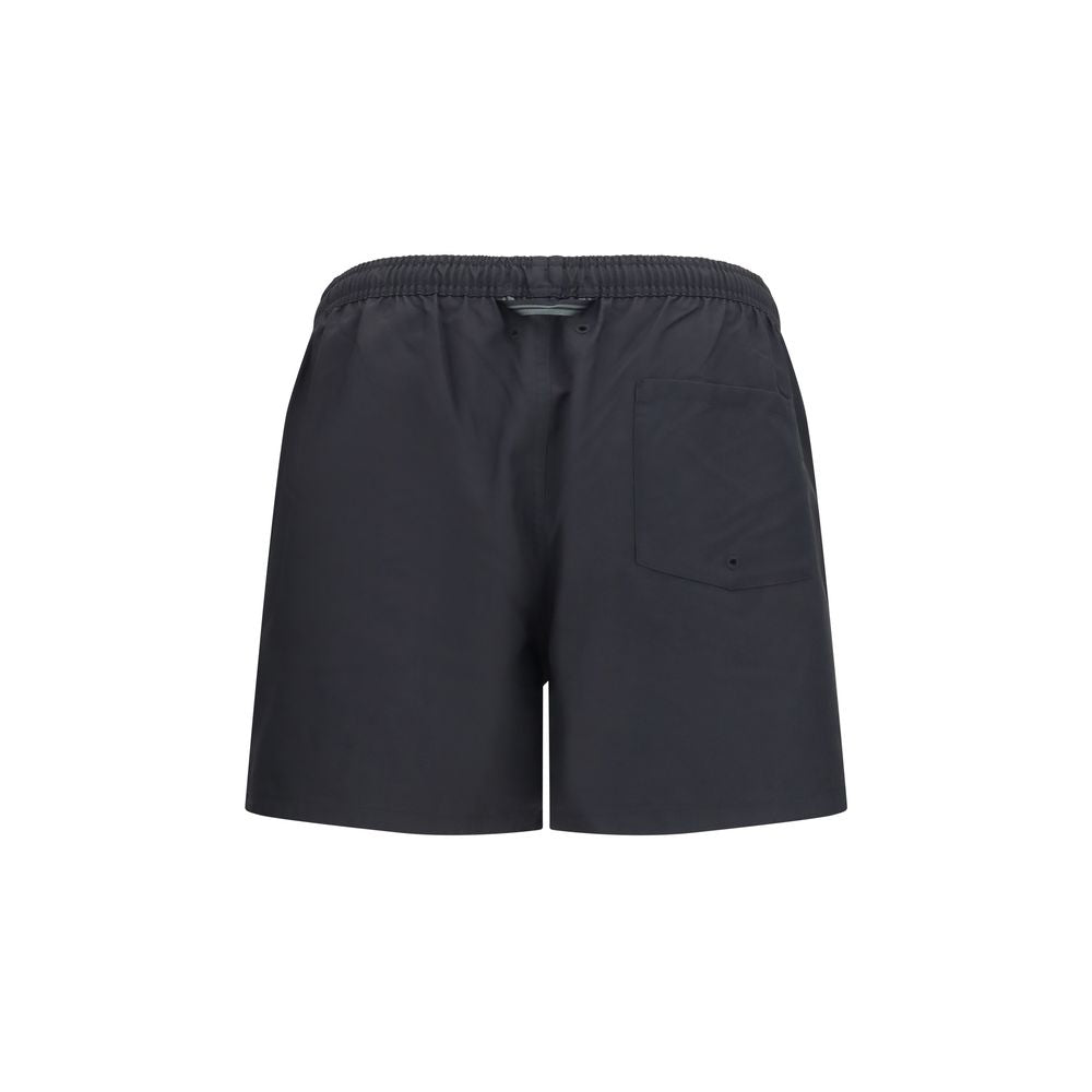Swim Shorts by Fred Perry for men in polyester black & signature features a magnificent design, channeling the luxury vibe of Laurel Perry Men's Polyester Swim Shorts.