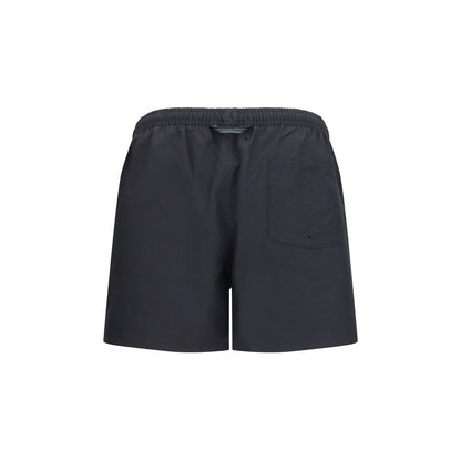 Swim Shorts by Fred Perry for men in polyester black & signature features a magnificent design, channeling the luxury vibe of Laurel Perry Men's Polyester Swim Shorts.
