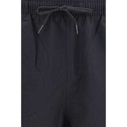 Swim Shorts by Fred Perry for men in polyester black & signature features a riviera-ready silhouette, showcasing the Laurel Perry Men's Polyester Swim Shorts design for a premium look.