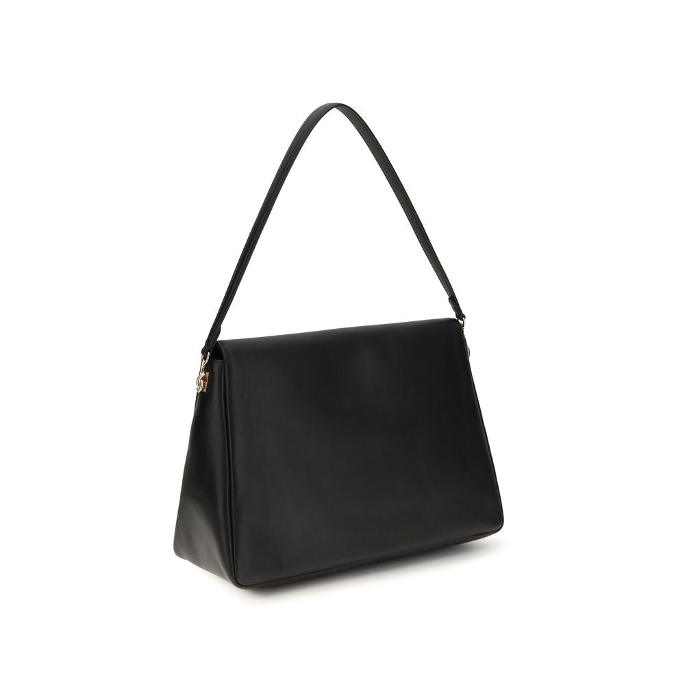 Large Shoulder Bag by Tory Burch for women in bos taurus calf nappa & suede leather black & signature features a distinguished silhouette, showcasing a secure snap, zipper & magnetic and distinguished with versatile shoulder-strap for a distinguished finish.