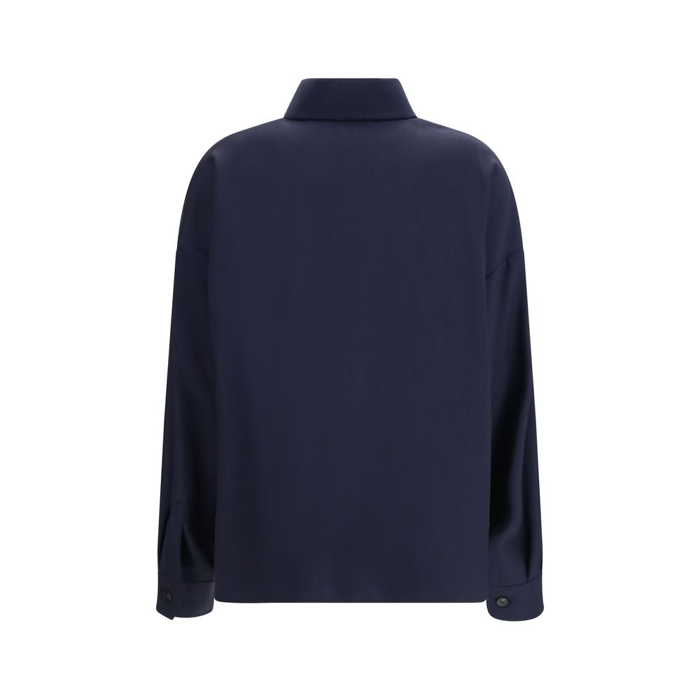 This Jacket by Max Mara for women in wool canvas blue & natural showcases a magnificent silhouette, meticulously crafted with a distinctive shirt-collar neckline and functional pockets for a magnificent finish.