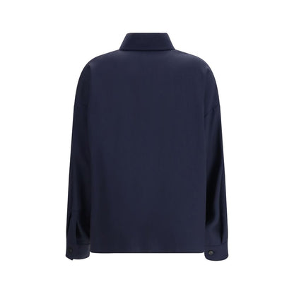 This Jacket by Max Mara for women in wool canvas blue & natural showcases a magnificent silhouette, meticulously crafted with a distinctive shirt-collar neckline and functional pockets for a magnificent finish.