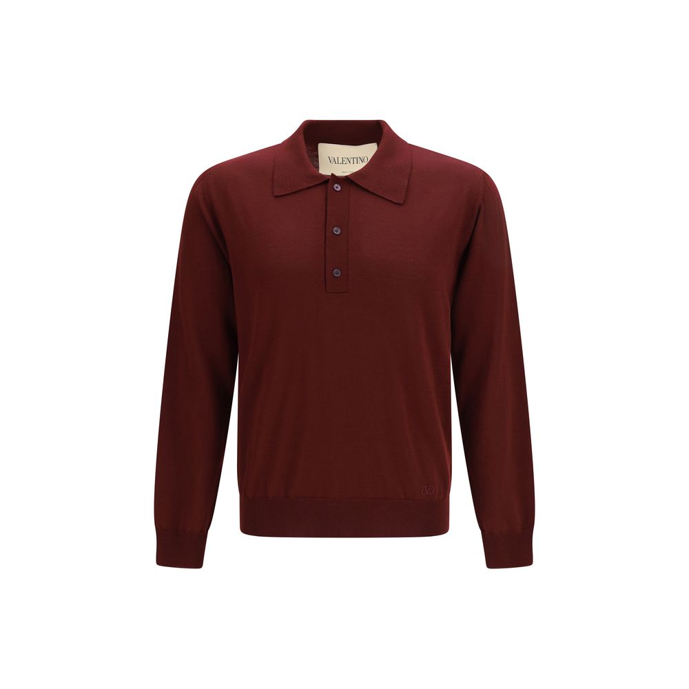 This Polo Shirt by Valentino Garavani for men in merino wool bordeaux presents a flawless silhouette, showcasing flawless long-sleeve detailing and a refined for a truly flawless aesthetic.
